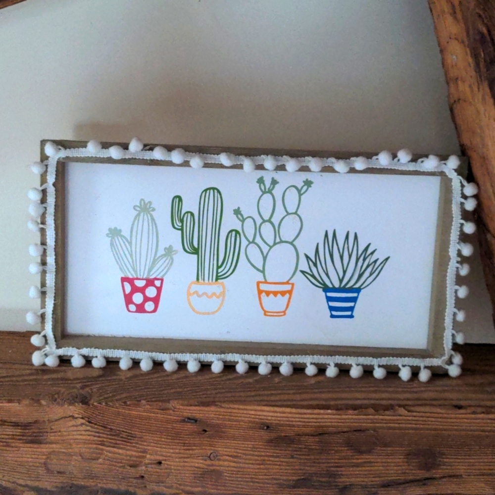 Wood framed cactus wall hanging